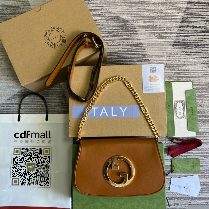 G*u*i top handle bags